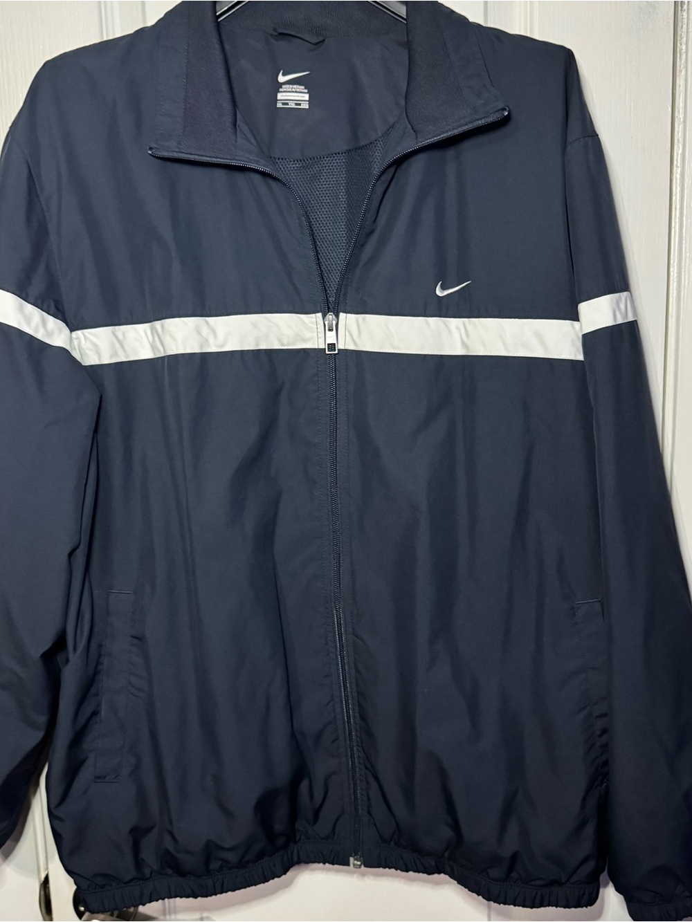 Nike Men’s Navy Windbreaker with White Chest Stripe